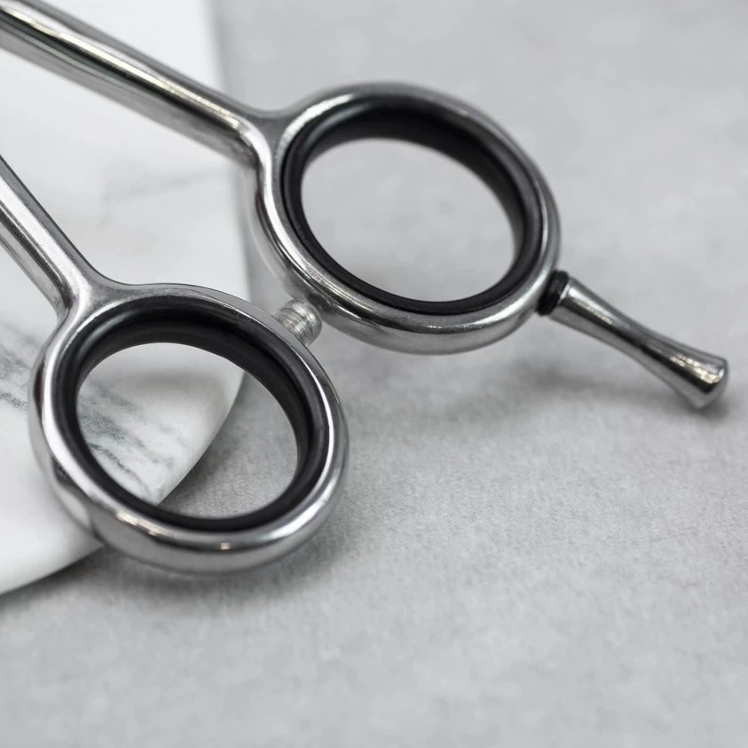 Tijera peluquero Air 7" en acero inoxidable 3 Claveles