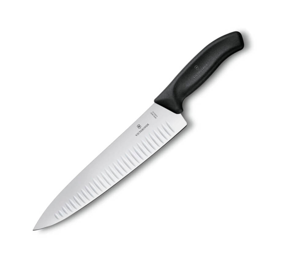 Cuchillo de chef Victorinox de mango negro con hoja alveolada de ...
