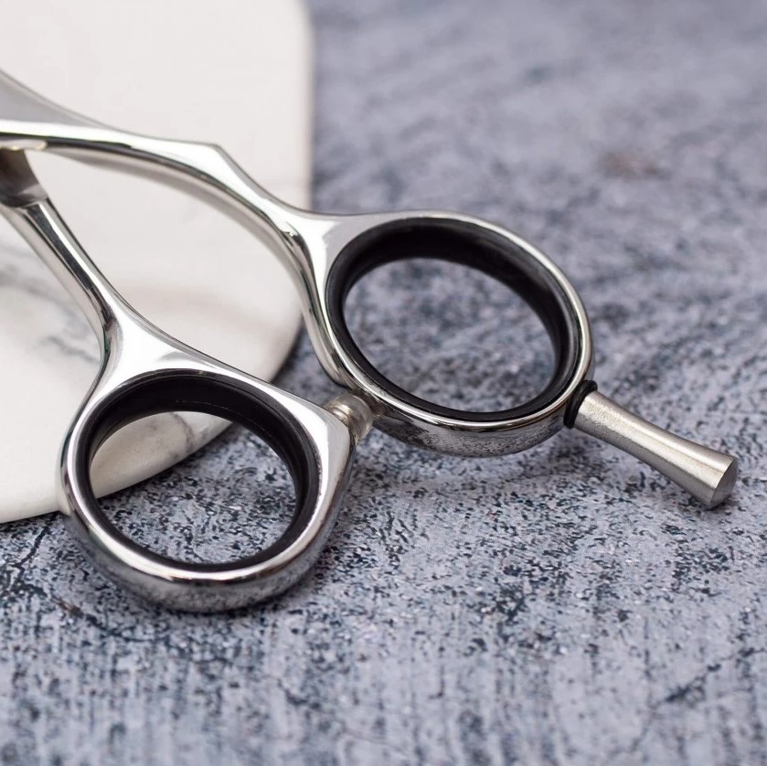 Tijera de peluqueria Toba ES28 5.5" con filo navaja 3 Claveles