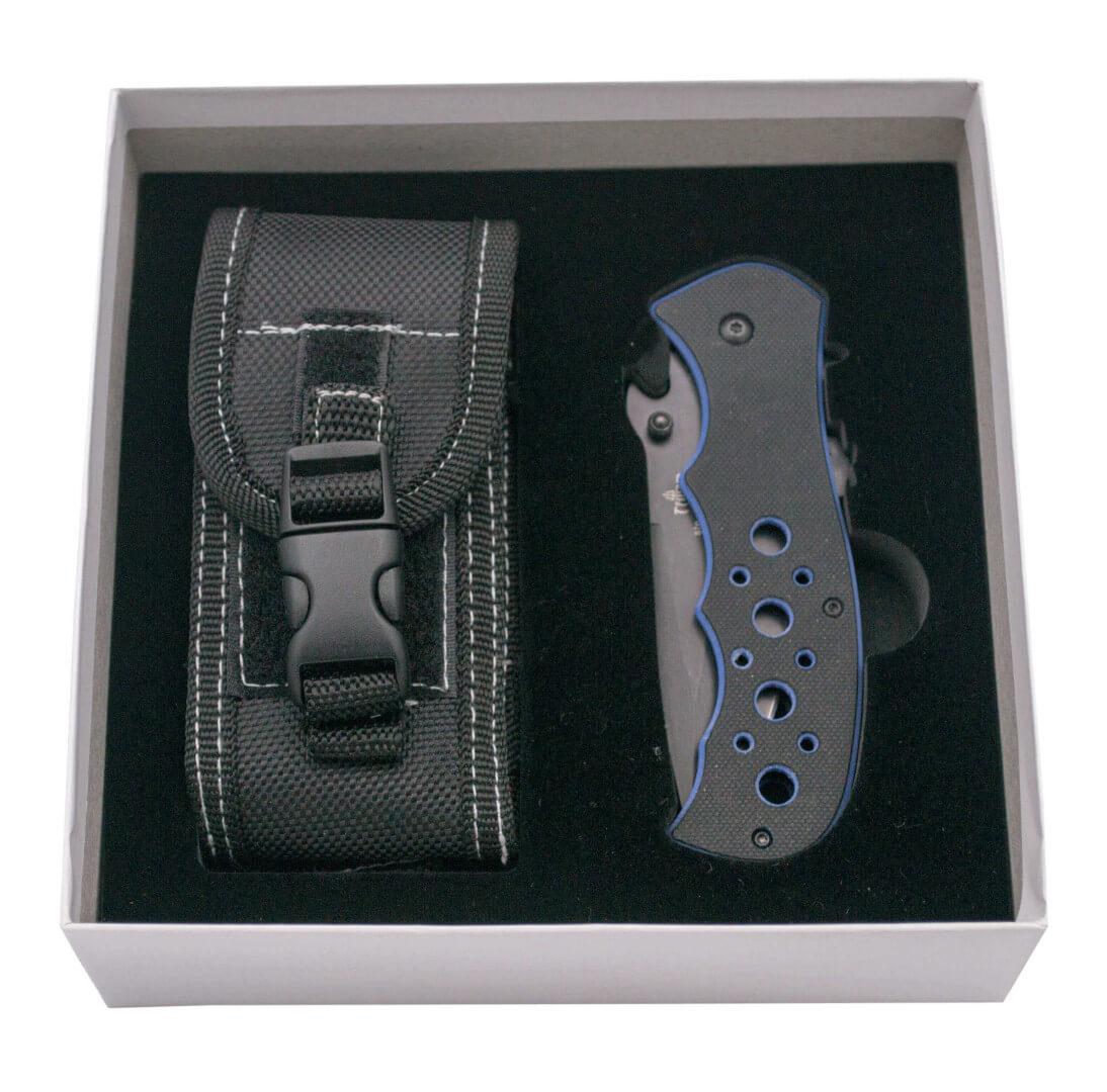 Navaja con apertura asistida y mango de G10 bicolor azul y negro con sierra